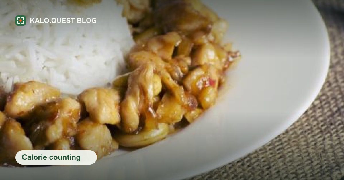 A white plate holding a mound of white rice next to pieces of chicken in sauce. Kalo.Quest blog.